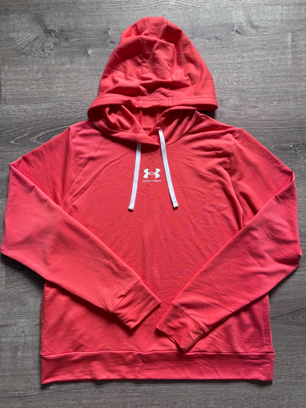Under Armour women’s bright Coral Pullover Hoodie with White Drawstrings